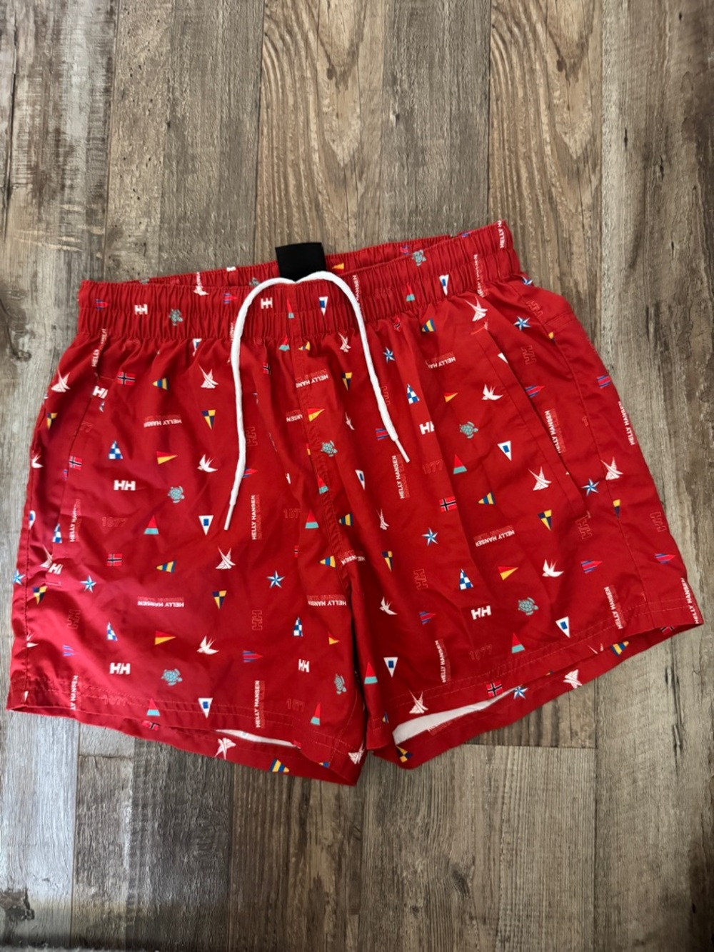 Helly Hansen Red Swim Shorts with Nautical Flag Print